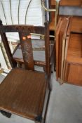 A mid 20th Century oak dining chair and a part period style nest