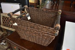 Two modern decorative seagrass baskets