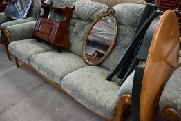 A late 20th Century Cintique three piece suite, comprising 3 seater settee and two armchairs,