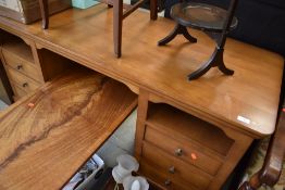 A modern stained frame pedestal desk