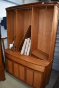 A modern Nathan teak wall unit, nice quality in real good condition, with glazed doors, some shelves