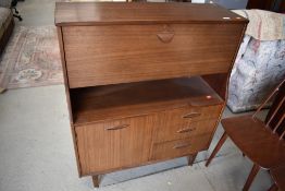 A vintage sapele bureau