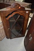 A 19th Century oak corner wall display cabinet