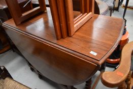 An early to mid 20th Century oak twist gateleg dining table , approx. Open length 153cm W108cm