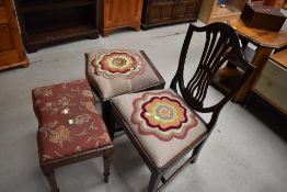An early 19th century mahogany dining chair having shield back with later tapestry seat on