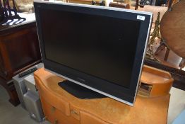 A Panasonic 32' TV and surround sound system