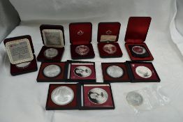 A collection of Silver Canadian Dollars comprising of six 1 Dollar, two 5 Dollar and one 10 Dollar