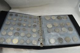 A album of Silver World Coins including USA, Europe, Commonwealth etc