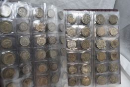 A coin album containing a collection of GB Silver coins, Three Pence to Crowns, pre Victoria-