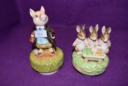 Two Rotating musical Beatrix potter ceramic collectable figurines by Schmid.