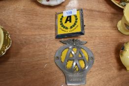 Two vintage AA car badges.