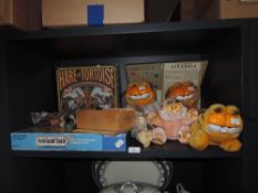 A selection of childrens board games and similar Garfield soft toys including Scrabble, Scotland