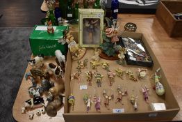 A collection of small Beswick and similar animal studies and small fairy charms.