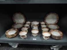 A part tea service by Royal Albert Crown China decorated and detailed by hand