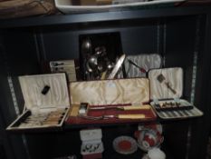 A good selection of table wares cutlery and flatware including boxed sets and large spoons