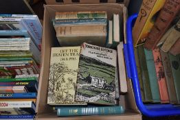 A variety of vintage country related books.