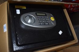 A Yale safe, as new in box.