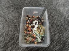 A selection of costume jewellery including beads and fashion watches etc