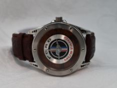 A gents quartz wrist watch commemorating Ford Mustang having plain dial to decorative face in