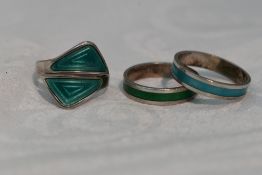 A pair of Norwegian silver and enamel band rings and a similar Norwegian silver and enamel dress