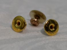 A cased pair of 9ct gold collar studs and a mother of pearl stud