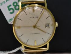 A gents Marvin automatic 18ct gold wrist watch,no:90837, having a baton numeral dial with date