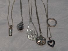 A selection of silver jewellery including band ring and pendants including Kit Heath ingot, sapphire