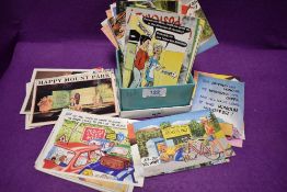 A large quantity of risqué/comedy postcards,including Brian Perry....possibly not for those with a