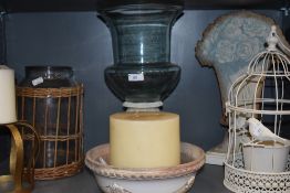 A varied lot of items, including large candles, and an ornamental bird cage.