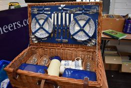 An Optima west Sussex wicker woven picnic hamper for four place settings
