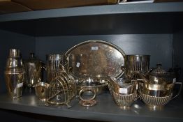 A collection of fine plated wares, amongst which are decorative trays and tea pots, champagne