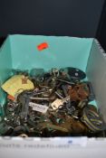 A box full of assorted keys.
