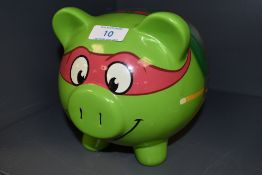 A Teenage mutant ninja turtles piggy bank.