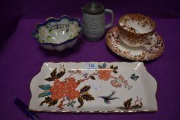 A selection of vintage and antique ceramics, including a large Samuel Radford moustache cup and