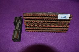Two vintage wooden printing blocks.