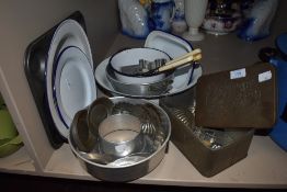 A large quantity of vintage kitchenallia including enamel bowls,small cake and pastry tins,