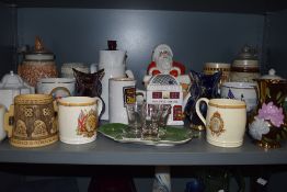 A large lot of ceramics, including Dudson, Carlton ware and various tea pots, commemorative mugs and