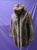 A vintage mink jacket with matching hat,around 1960s in a shorter length and in soft and supple