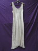 A 1920s full length champagne velvet dress, very good condition for its age, with only minor