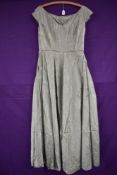 A pale green 1940s evening gown having side hook and eye fastening, good condition bar some age