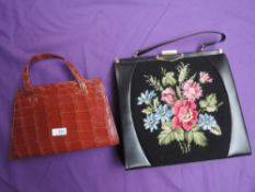 Two vintage handbags, one large one with floral needlepoint to front and the other reptile with