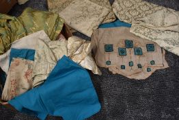 A box full of vintage curtains, pelmets, fabrics and similar.good condition.