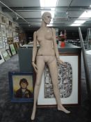 A full size female mannequin.