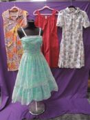 Four vintage dresses,some lovely bright floral fabrics used throughout, mixed styles, sizes and