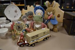 A selection of childrens toys and teddies including Tonka truck and Beatrix Potter plush toys