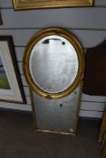 Two gilt and plaster framed mirrors.