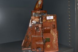 An unusual studio art ceramic in a terracotta pottery in the style of a Eastern abode