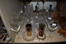 A mixed lot of glass including wine glasses, cut glass ash tray, vases and decanter.