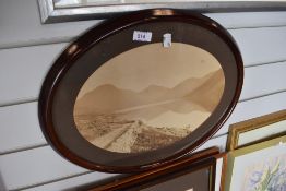 A vintage oval framed local interest photograph