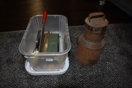 A selection of kitchen wares including cutlery and dairy can